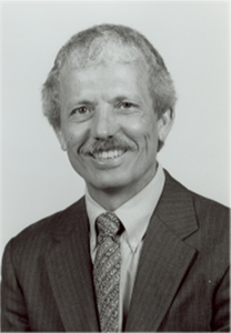 A headshot of Dr. Michael E. Fourney