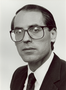 A headshot of Dr. James D. Wilson.